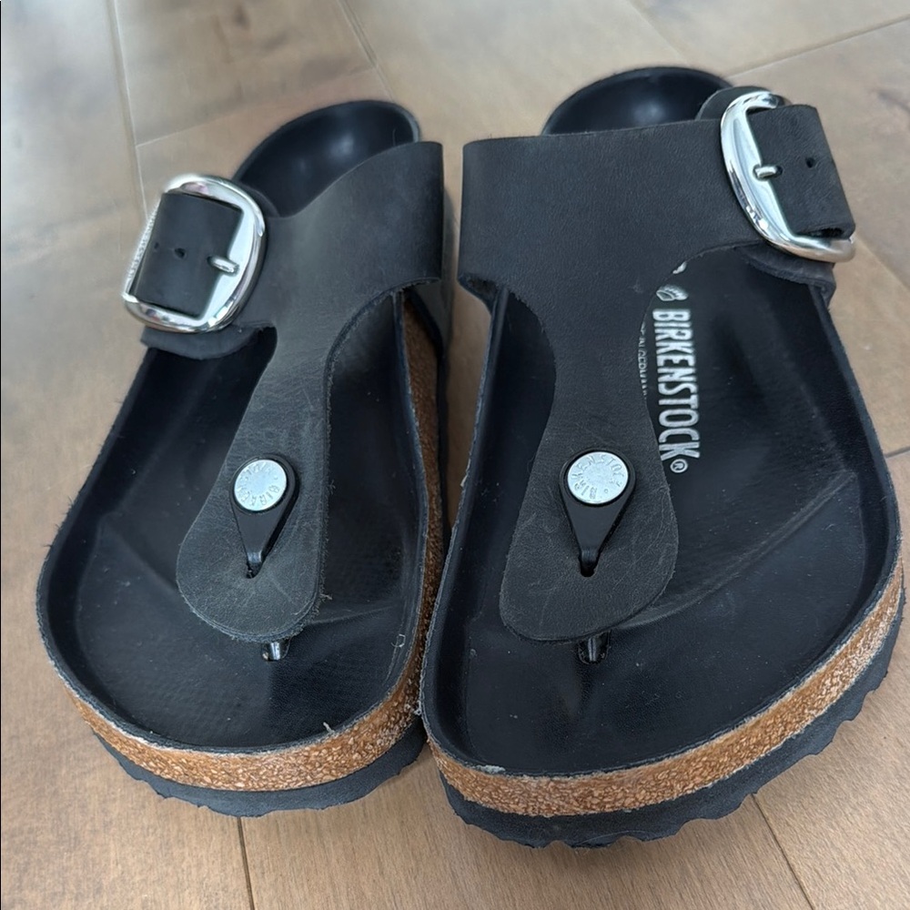 Birkenstock Womenโs Black Thong Sandals with Cork Footbed